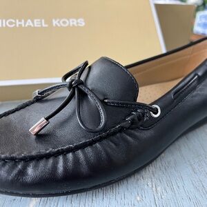 Michael Kors Black Leather women’s Sutton Moc Leather Slip-Ons